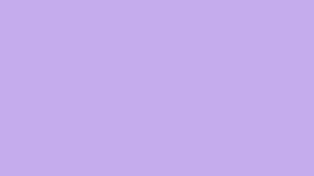 Solid lavender color background representing healing and calming effects in color therapy.
